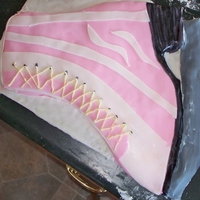 Ice Skate Cake Yellow cake covered in fondant with icing laces.