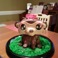 Littlest Pet Shop Monkey Yellow cake covered in modelling chocolate.