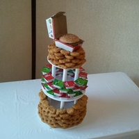 Chicken Nugget Cake yes they are real McDonald's Chicken Nuggets! middle layer is sauce packages and the topper is a real bigmac...lol...just to say this...