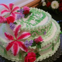 Retirement Cake For My Friend Finished cake with gumpaste roses, leaves, stargazer lilies and blossoms.