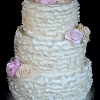 Ruffles And Roses Wedding Cake I created this for my friends getting married, they wanted something with ruffles and roses to fit in with their whimsical and antique...