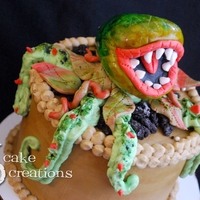 Audrey 2 - Little Shop Of Horrors My hubby is a huge fan of the movie/play Little Shop of Horrors and so he wanted an Audrey 2 cake for his birthday :)