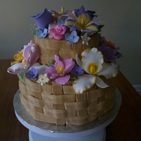 Buttercream Basketweave And Gumpaste Flowers Buttercream basketweave and gumpaste flowers.