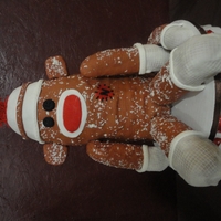 Sock Monkey Cake and cupcakes I made for my son's birthday. A special thanks to Karen421 for the inspiration and guidance :)