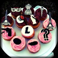 Fatal Parisian Fashion Show a murder mystery party. a beret, stiletto, wire dressing mannequin, masquerade mask, pistol, Eiffel Tower, dagger, thumbprint/magnifying...