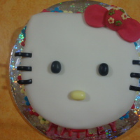 Hello Kitty Cake Hello Kitty face cake with flowers