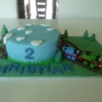 Thomas Tank Engine The Thomas's were supplied by customer. Everything else was made by fondant, the rocks, tracks and trees. It is more fiddly than I...