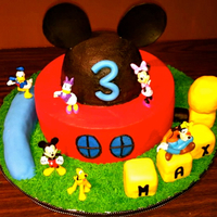 Mickey Mouse Clubhouse Inspired by the many Mickey cakes on CC. All buttercream with fondant accents. Characters were bought from the disney store. TFL!