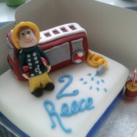 Fireman Sam Birthday Cake A buttercream and jam filled sponge cake covered in fondant and decorated with a handmade fondant fireman and a rice krispie fondant...