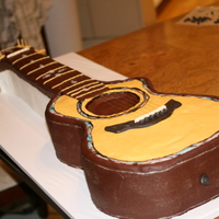 Taylor Guitar Cake I made this cake for a very musical family that we know, for their son's wedding. It was designed after the Taylor 914 Guitar....