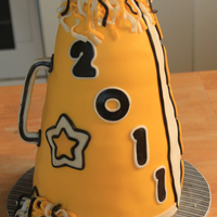 Cheerleader's Megaphone Made for the local high school's Cheerleader banquet. Mixed chocolate and vanilla layers with white chocolate ganache and MMF.