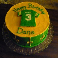 Packer Jersey Birthday 3yo birthday cake with Green Bay Packer theme. Frozen bc transfer attempt with jersey, but I made it too thick. Lesson learned.WASC cake...
