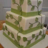 Vines And Leaves This was my first wedding cake order, from a friend. More work than I had imagined, but certainly worth it!Bottom Tier - yellow cakeMiddle...