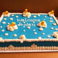 Duckie Cake baby shower cake
