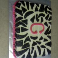 Zebra Print Tie-Dyed Birthday Cake Zebra print on the outside with pink trim...tie-dyed cake inside.