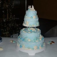 Sea Shell Cake tiered wedding cake with hand made blue and white chocolate shells