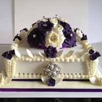 Royal Iced, With Sugarpaste Roses, Purple, Ivory This was my first ever wedding cake, Its friut, royal iced with royal piping and corners, with sugarpaste roses and leaves. It reached it...