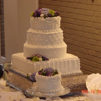 Keely's Weddine Bottom tier was 14" square, then 12" round, 10" round and 8" round. We had the 6" anniversary cake to the side....