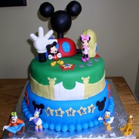 Mickey Mouse Clubhouse Mickey Mouse Clubhouse birthday cake for a 1 year old. Top tier is chocolate with vanilla buttercream, bottom tier is white with vanilla...