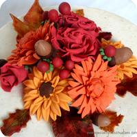 Fall Flowers Anniversary Cake Colorful fall flower bouquet on a 50. wedding anniversary cake. I made golden yellow gerbera daisies, chrysanthemum in burnt orange, and...