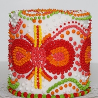 Dots And Dots This is a mini cake 4". Decorated with dots and bright colors.