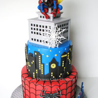 Spiderman Cake A Spiderman cake for a special little boy: classic chocolate cake filled with cookies 'n cream buttercream and milk chocolate ganache...
