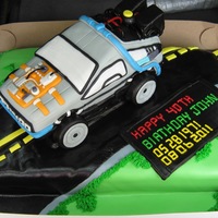 Back To The Future... 1/2 + 1/2 choc/vanilla, car is carved from madera cake.
