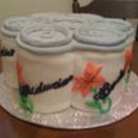 Budwieser Tattoo Cake 4 Daisy pan vanilla cakes with milk chocolate butter cream/ fondant.The lily and script is from the client's tattoo. they 're...
