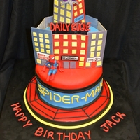 Spiderman Spiderman cityscape scene with Daily Bugle and green goblin. Chocolate cake covered with fondant. Details made with gumpaste except Green...