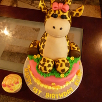 Baby Giraffe Cake Made this for a 1st birthday. The giraffe is made out cereal treats which turned out to be a little to heavy next time I will be sure to...