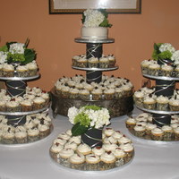 Wedding Cupcakes Cupcakes are all white - half with strawberry filling and half with chocolate ganache filling. I made the stands myself using the bride&#...