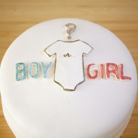 Baby Gender Reveal Cake a baby gender reveal cake for announcing the gender of the baby with a pink or blue ombre cake inside. (it was PINK!)