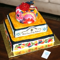 Graduation Fiesta Cake This was a cake for a graduation party with a fiesta/mexican theme. the cake has "Mexican Paper Flower" made of fondant and a...