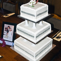 3 Tier Ruby Wedding Cake This was a replica of my Mum and Dad's original 1970's wedding cake made to celebrate their Ruby Wedding. Bottom dummy tier, Rich...