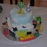 Toy Story Cake My first attempt at a 'proper' cake, influenced by the so many lovely Toy Story cakes in the gallery. Fondant covered, vanilla...