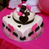 Bridal Shower Cake My first stacked cake. Marble cake, chocolate ganache filling, fondant covered, fondant decorations, the bride and groom's name are on...