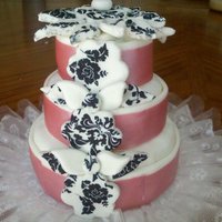 Birthday Cakelet - Personal Cake Personal sized cakelet covered in mm fondant and detailed w pink shimmer icing ribbons and damask icing sheets. 4" tall.