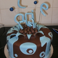 Exploding Cake first attempt at a exploding cake, was going well till the letters spelling charlie started breaking :( and also the fondant that was...