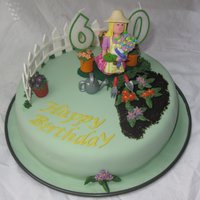 Gardeners Birthday Cake designed around a Culpitt model I was given. All the rest is hand made, including filling her plant pots!