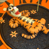 Tigger Birthday Cake 50th birthday cake for a special woman who loves Tigger and refused to put her age on the cake,instead requested to put "Recycled...