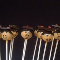 Graduate Pops pops for a boy graduating college, who has a mustache, and likes to wear his shades.