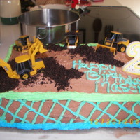 Road Construction Cake This is the second cake I ever made and the first with no help at all. I wanted something with tractors for my little boy's second...