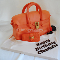 Handbag Birthday Cake Red velvet birthday cake in the shape of a handbag and wallet with vanilla buttercream filling and covered in sugar paste.. Lipstick and...