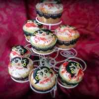Betty Boop Cupcakes made with fondant for the little faces