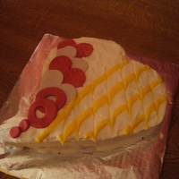 Luved Up allbutter sponge with choclate ganaish and blueberry filling,covered in royal iceing