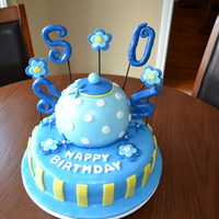 50Th Birthday Teapot Cake Bottom cake is a dark chocolate cake with amaretto chocolate cream filling and the teapot is a strawberry cake with strawberry buttercream...