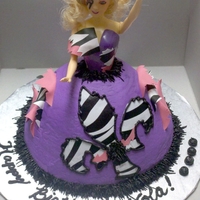 Lady Gaga Doll Cake Requested by client to do Lady Gaga doll cake for her 4 year old's birthday. Favorite colors were used and cake is strawberry with...