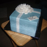 Tiffany Box Cake This was my first tiffany box cake, two bottom layers are chocolate and then next two layers are yellow cake. There is butter cream between...