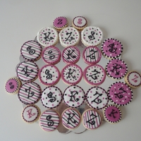 Bat Mitzvah Cookies Theme was black, pink and white, polka dots and stripes. This was done for triplets, they wanted their 1st initial monogrammed on the...