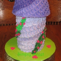 Rapunzel Tower Cake I made for my daughter's 5th b-day. Yellow cake with vanilla butter cream.